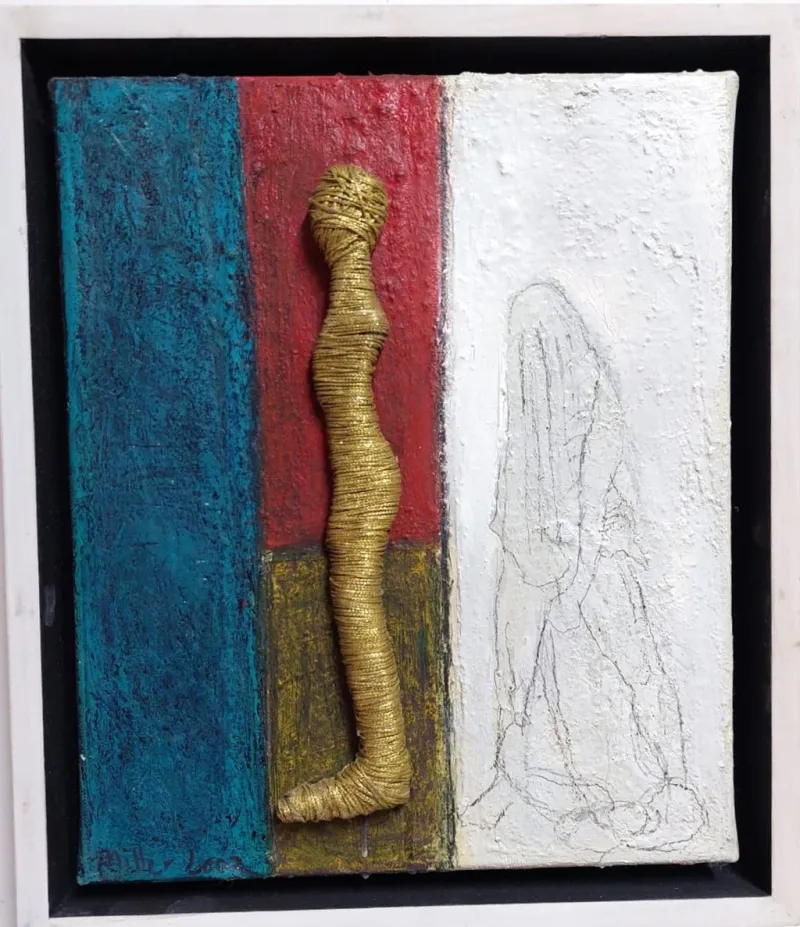 Figure-and-figurine-in-gold
