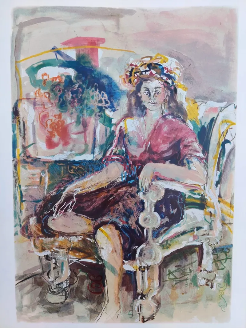 A-woman-sitting-in-an-armchair